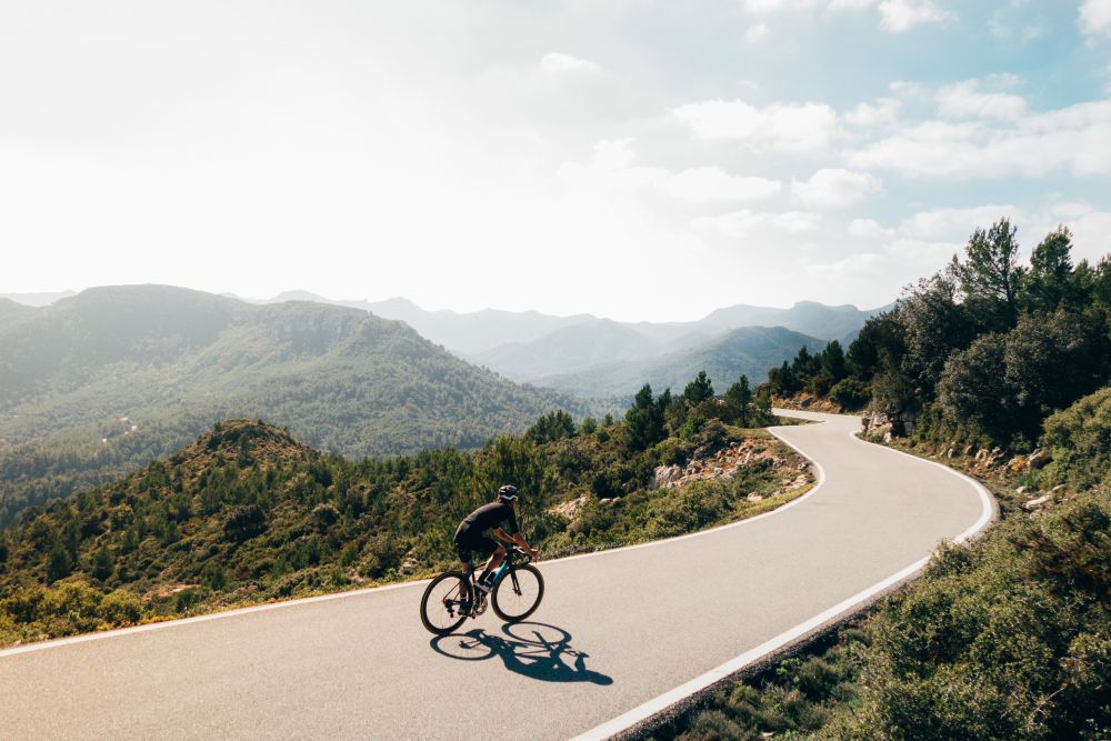 cyclist on mountain road